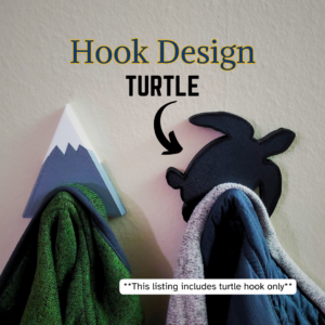 A turtle coat hook designed to hang sweatshirts, jackets and towels created by Ziggy Zig Designs.