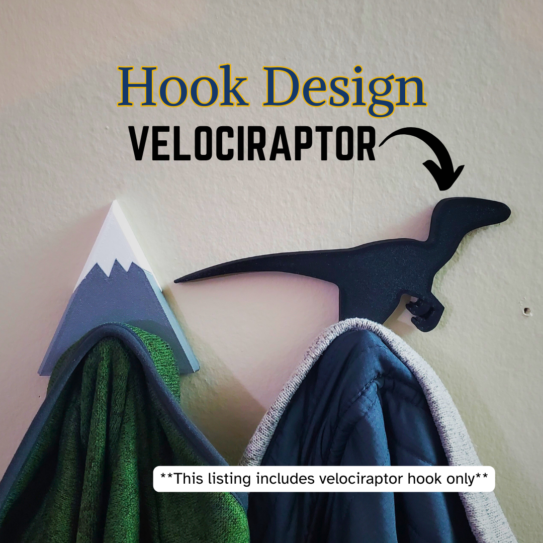 A Velociraptor coat hook designed to hang sweatshirts, jackets and towels created by Ziggy Zig Designs.